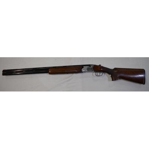 329 - A Beretta model 682 12 gauge O/U double barreled shot gun. Serial E43794B. Barrell length 28'. Overa... 