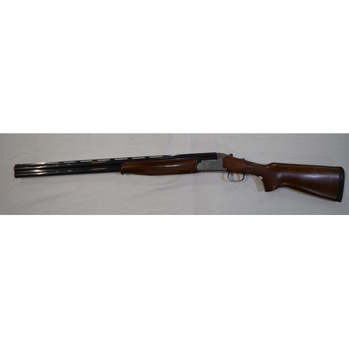 330 - An engraved Zabola 12 gauge O/U double barrelled shot gun. Serial No 60-03-1156 02. Barrell length 2... 