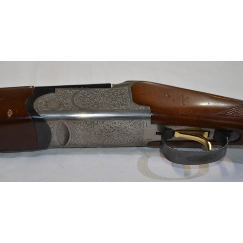 330 - An engraved Zabola 12 gauge O/U double barrelled shot gun. Serial No 60-03-1156 02. Barrell length 2... 