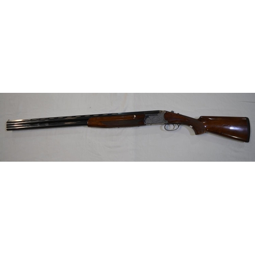 331 - An engraved Lanber 12 gauge O/U double barrelled shot gun. Serial No 178033. Barrell length 27.5'. O... 