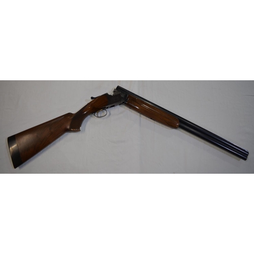 333 - A Miroku 12 gauge O/U double barrelled shot gun. Serial No 725544. Barrell length 26'. Overall 44.5'... 