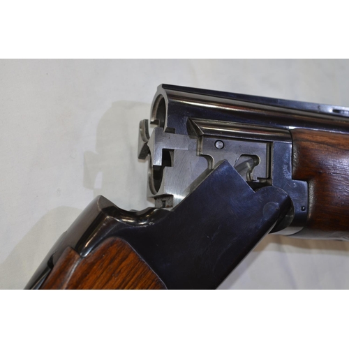 334 - A Browning Citori 12 gauge O/U double barreled shot gun. Serial No 40774. Barrell length 28'. Overal... 