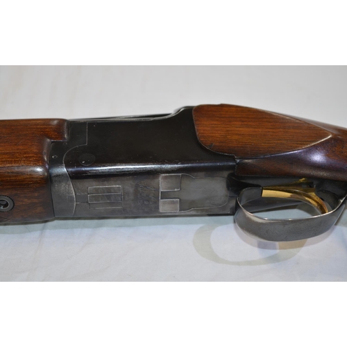 334 - A Browning Citori 12 gauge O/U double barreled shot gun. Serial No 40774. Barrell length 28'. Overal... 