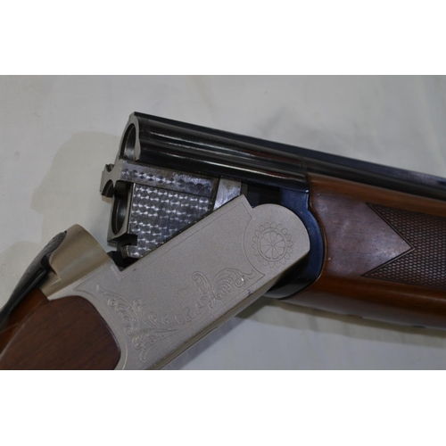 335 - A Tornado 20 gauge O/U double barrelled shot gun. Serial No B3761. Barrel length 28'. Overall 45.5'.... 