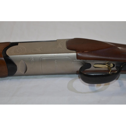 335 - A Tornado 20 gauge O/U double barrelled shot gun. Serial No B3761. Barrel length 28'. Overall 45.5'.... 