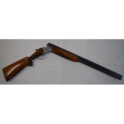 337 - A Laurona 12g O/U double barrelled shot gun. Serial No 129669. Barrell length 28'. Overall 44.5'.
Do... 