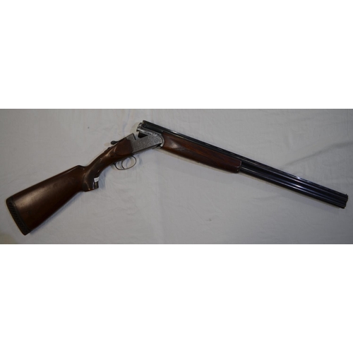 338 - A Hilton Century 12 gauge O/U double barrelled shot gun. Serial No 9821. Barrell length 27'. Overall... 