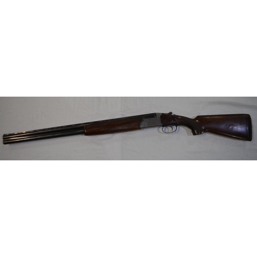 338 - A Hilton Century 12 gauge O/U double barrelled shot gun. Serial No 9821. Barrell length 27'. Overall... 