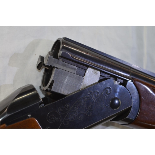 339 - A Valmet 12 gauge O/U double barrelled shot gun. Serial No 103551. Barrell length 28'. Overall 45'.
... 