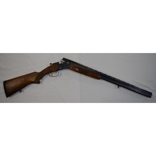 340 - A Baikal 20 gauge O/U double barrelled shot gun. Serial No 022704939B. Barrell length 28'. Overall 4... 