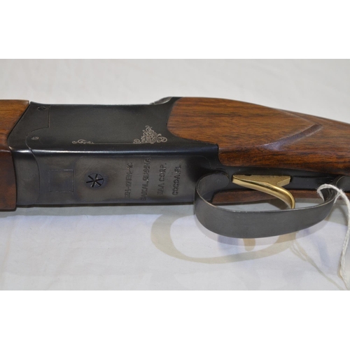 340 - A Baikal 20 gauge O/U double barrelled shot gun. Serial No 022704939B. Barrell length 28'. Overall 4... 