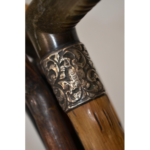 113A - 5 walking sticks, 1 with hallmarked silver upper band.