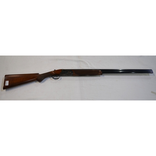 446 - A John McNab Highlander 20 gauge over under double barrelled shotgun with fleece lined brown leather... 