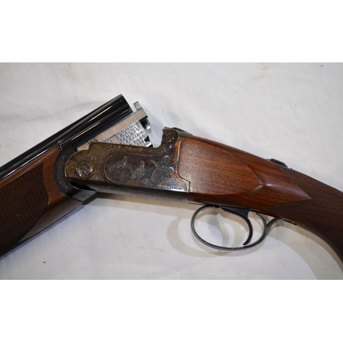 446 - A John McNab Highlander 20 gauge over under double barrelled shotgun with fleece lined brown leather... 