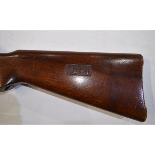 501 - A BSA under lever top loading .22 air rifle with BSA engraved into wood stock.