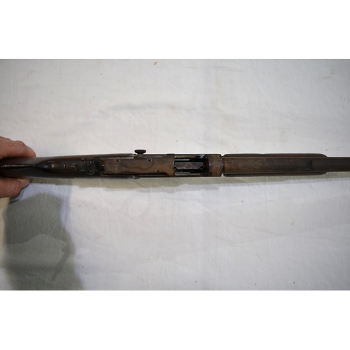 505 - A rare Winchester .22 rim fire pump action rifle, circa 1890 with additional rear sight. Section 1 l... 