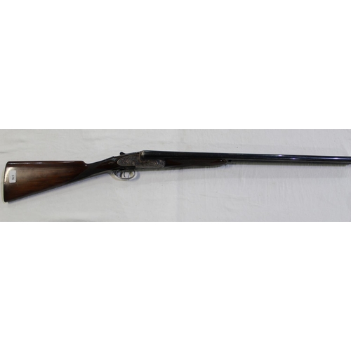 376 - A Sarasqueta Gun Co side lock 12 gauge side by side double barrel shot gun. Double trigger, non ejec... 