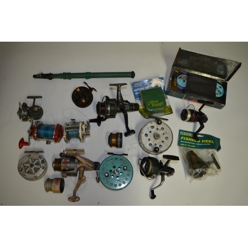 65 - A collection of fishing equpiment including side arm reels, multipliers, centrepin reels, fishing li... 