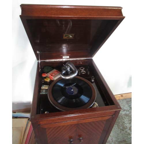 409 - C20th HMV mahogany cased cabinet gramophone, hinged top above two doors, on square supports, with ha... 