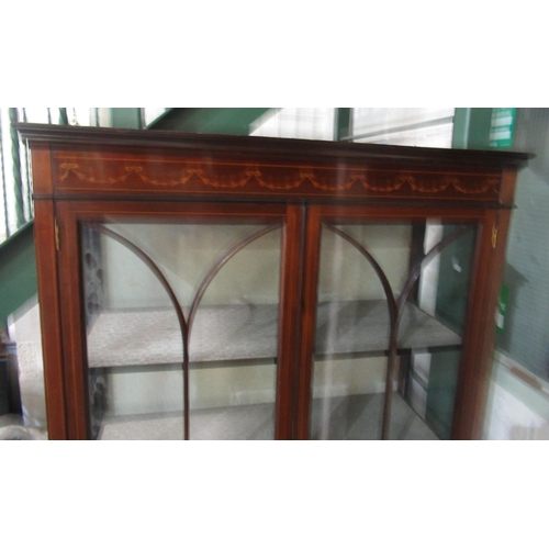 413 - Edwardian inlaid mahogany two-door display cabinet on square supports, W90cm D33cm H175cm