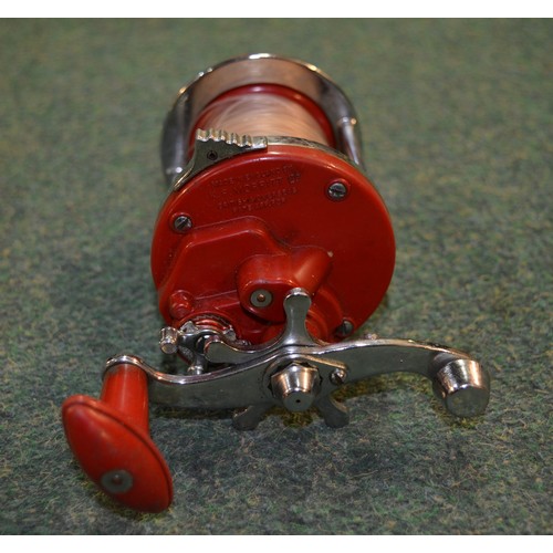 68A - 3 glass fibre sea-fishing rods and a K.P.Morritt Intrepid Sea-Streak multiplier reel.
Rods: 
A Shake... 