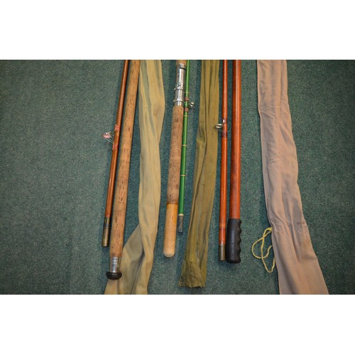 85 - 3 vintage glass fibre bbeachcasting/boat/pier fishing rods and a collection of sea fishing equipment... 