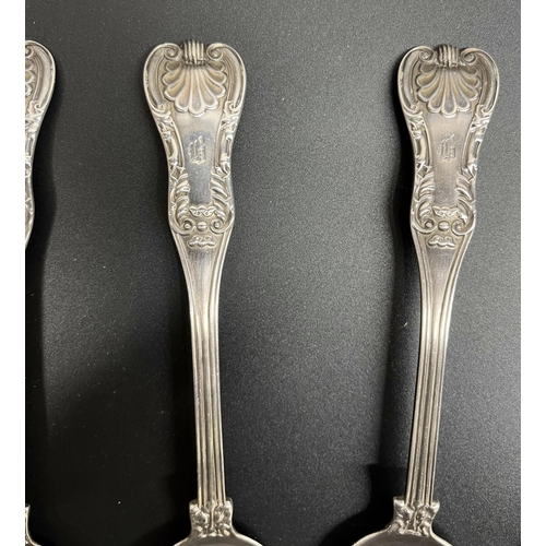 1044 - Set of four Scottish hallmarked silver Kings pattern dessert spoons, probably Mitchell & Sons Glasgo... 