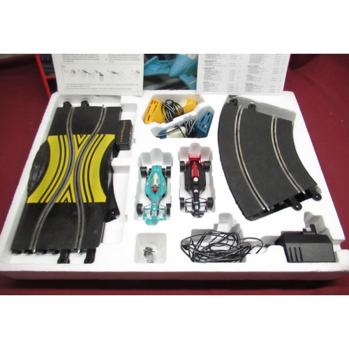 1107 - Hornby Monaco GP Scalextric set and a Hornby Scalextric Accessory Set (both appear complete)