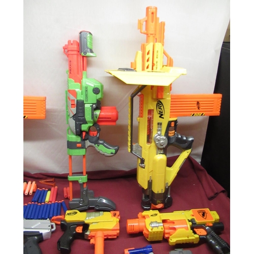 1110 - 13 Nerf Guns with accessories and foam projectiles with 2 toy guns