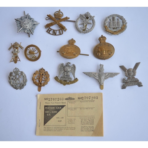 783 - A collection of military cap badges including The Long Range Desert Group, RNAS, Royal Flying Corps,... 