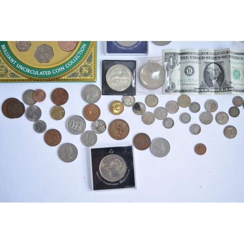 786 - A large collection of coins and commemorative coins including a Britannia fine silver £2 coin from 1... 