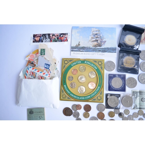 786 - A large collection of coins and commemorative coins including a Britannia fine silver £2 coin from 1... 