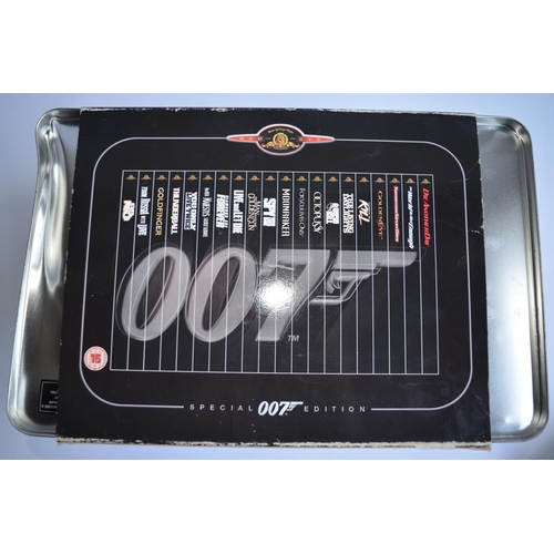 792 - A cased collection of James Bond 007 DVDs in presentation tin by MGM. 20 films upto and including Di... 