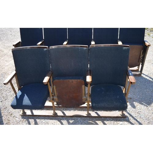 449 - Run of three Kalee cast iron framed Cinema seats with curved backs and lift-up seats, L150cm D43cm H... 