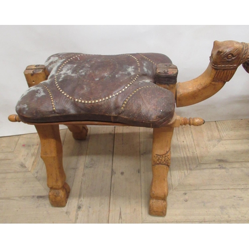 1141 - Pair of Middle Eastern Camel saddles with tooled leather seats