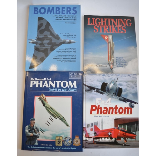 796 - A collection of mostly aviation related reference books including F-4 Phantom by Tim Mclelland (hard... 