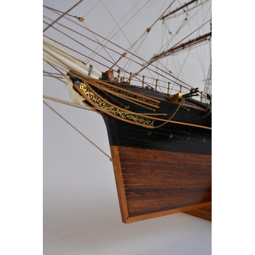 754 - A 1/84 scale full hull model of the tea clipper Cutty Sark. Hand made in wood. Overall length approx... 