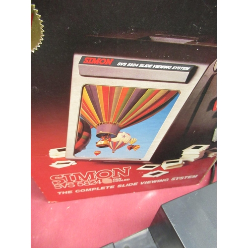 63 - Prestinox 35mm slide projector with spare magazines, Agfascop 200 slide viewer, Simon slide viewer, ... 