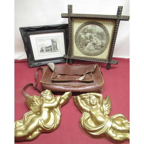 69 - Two gilt plaster cherub plaques, C19th style engraving, C20th print in frame, 1970's leather satchel... 