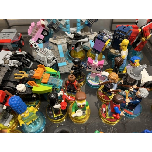 1116 - Collection of Lego figures and vehicles from movies and tv shows inc. Lego Dimension figures with po... 