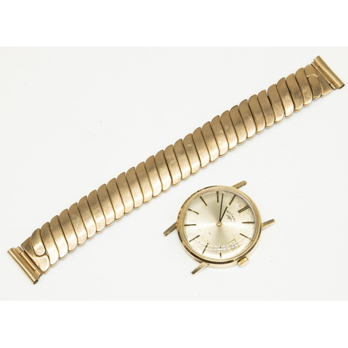 745 - Mid 1970's rotary 9ct gold cased handwound wristwatch with date, signed silvered dial with applied b... 