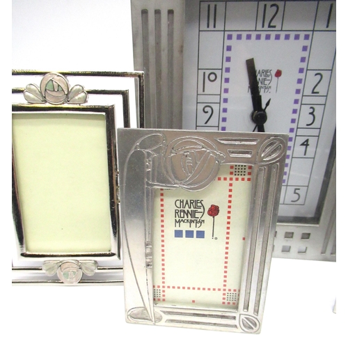 61 - Collection of Charles Rennie Macintosh pewter including a clock, photo frames and a box, and a colle... 