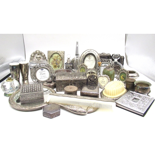 65 - Collection of pewter and other metalware including trinket boxes, dressing table set, photo frames, ... 