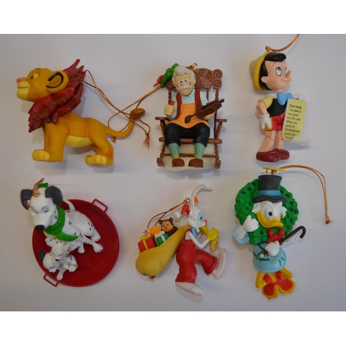 828 - 11 Christmas tree hangers by Disney, all boxed and in excellent/near mint condition. Includes Geppet... 