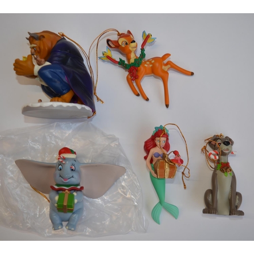 828 - 11 Christmas tree hangers by Disney, all boxed and in excellent/near mint condition. Includes Geppet... 