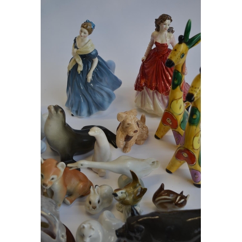 831 - A collection of ceramic animals, 2 Royal Doulton figurines, pewter fantasy scenes etc (3 boxes) and ... 