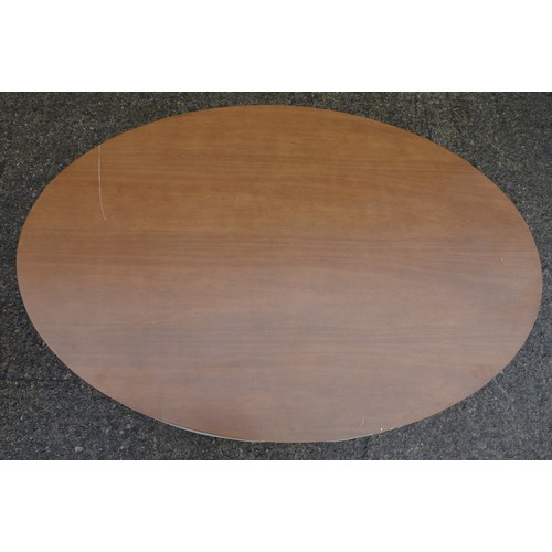 834 - An oval coffee table with 4 pull out padded seats, each with storage space inside. Table dimensions:... 