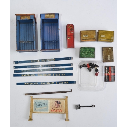 838 - A collection of pre-war Meccano and Hornby tin plate and cast metal O gauge accessories.