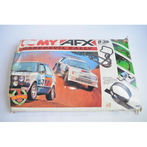 839 - A Tomy AFX Daredevil Rally slot car set.