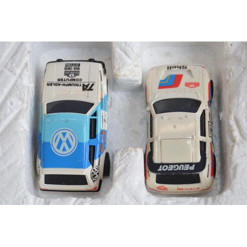 839 - A Tomy AFX Daredevil Rally slot car set.